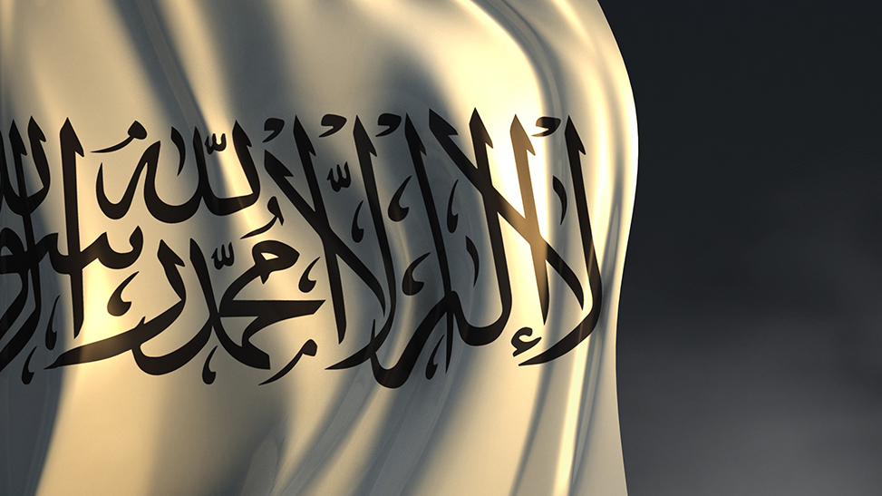 Taliban Flag with Dark Background.