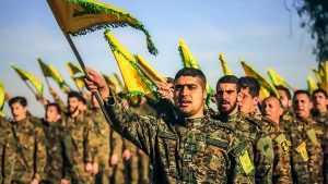 Hezbollah Members Standing During a Funeral of a Senior Official Member in South Lebanon.