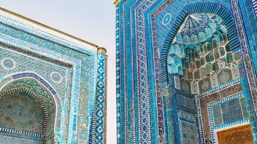 Close-up view of ornate blue-tiled portals in Shah-i-Zinda necropolis complex in Samarkand, Uzbekistan. April 25, 2023