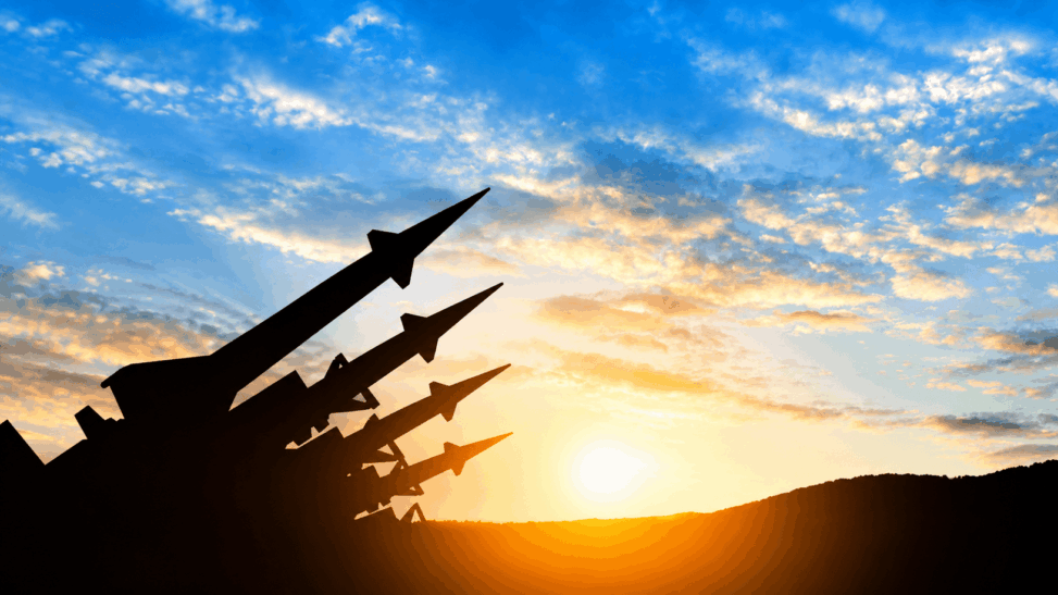 Missiles against a setting sun